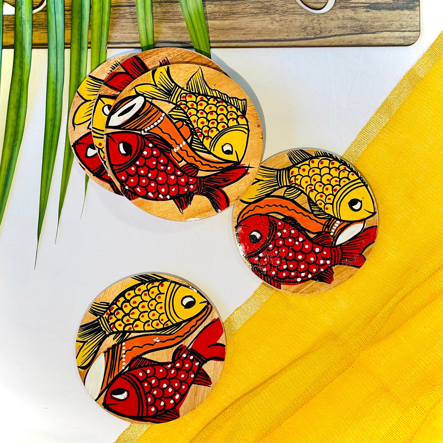 Alokya - Round coasters: fish painted on the surface.