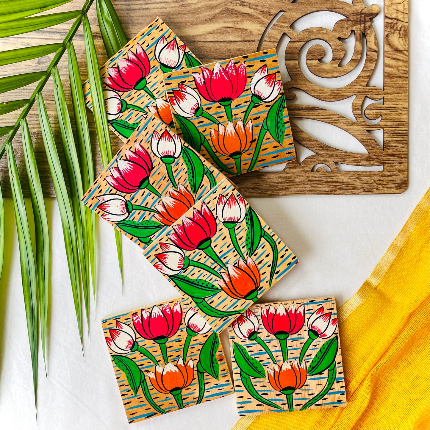 Alokya - Square coasters: Lotus painted on the surface.
