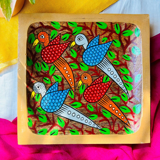 Square wood tray made from locally sourced pure mango wood and hand-painted with Indian folk art, Pattachitra motif of four birds and tree branches by the generational Pattachitra artists of Pingla