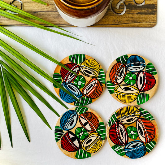 Alokya - Round coasters: Tabla painted on the surface. Set of four.