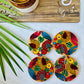 Alokya - 100% natural, Pattachitra painted terracotta coasters  - Round coasters: birds painted on the surface.