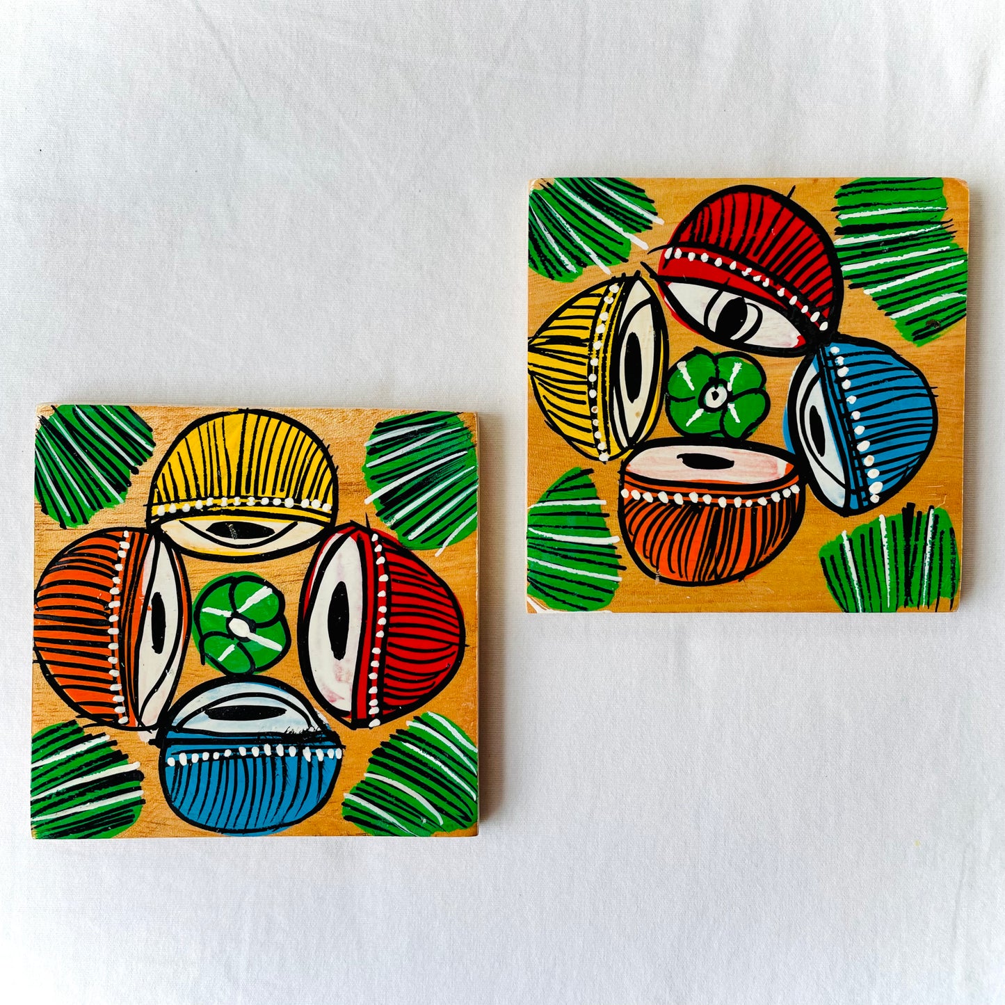 Alokya - Square coasters: Tabla painted on the surface. Set of two.