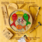 Men's neem wood beard comb, unisex neem wooden comb, cotton bamboo earbuds, tongue cleaner, bamboo toothbrush, bamboo wooden shaving razor displayed around a bamboo box hand painted with fish paintings in traditional Pattachitra art form style.