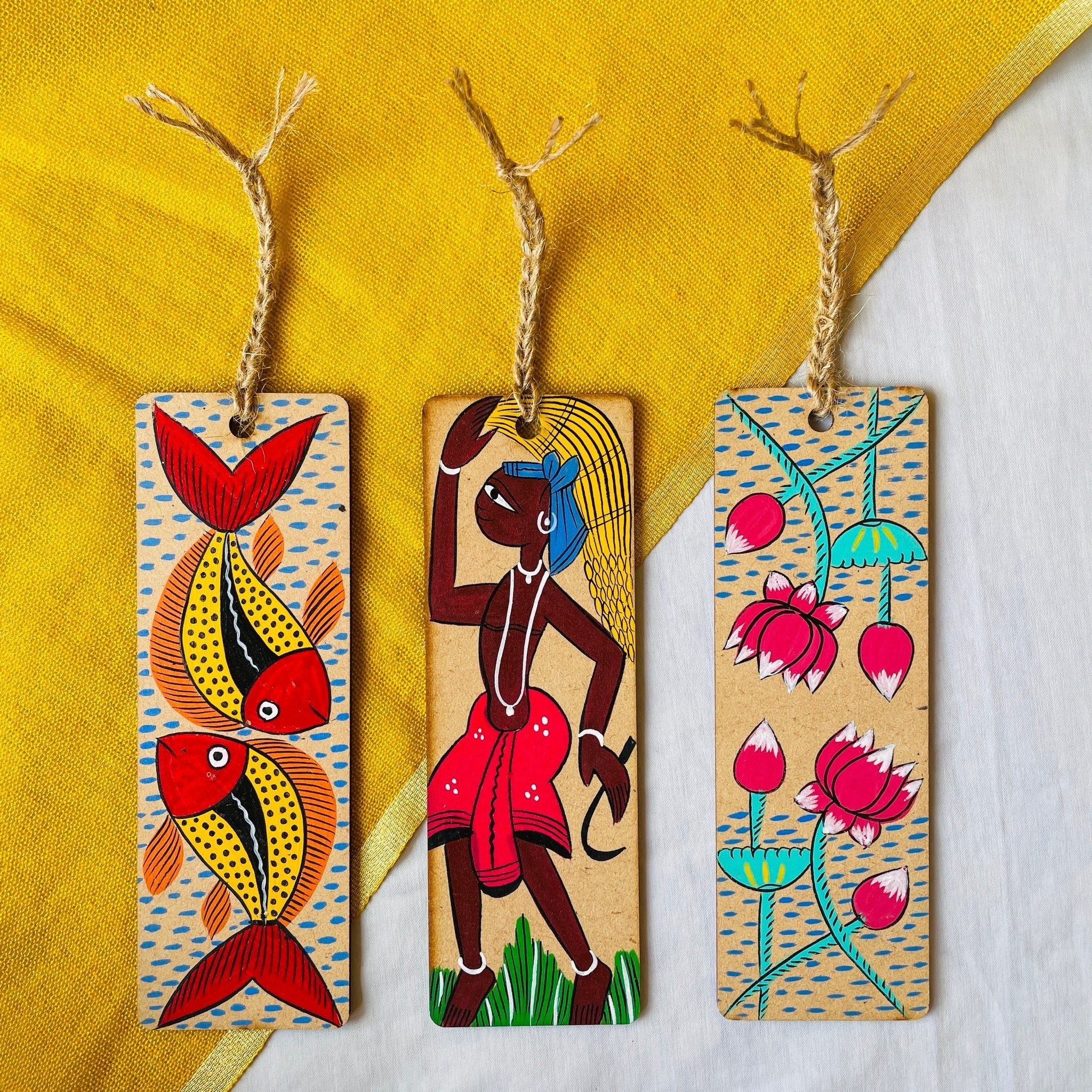 Rectangle wooden bookmark with fish, flower and tribal paintings