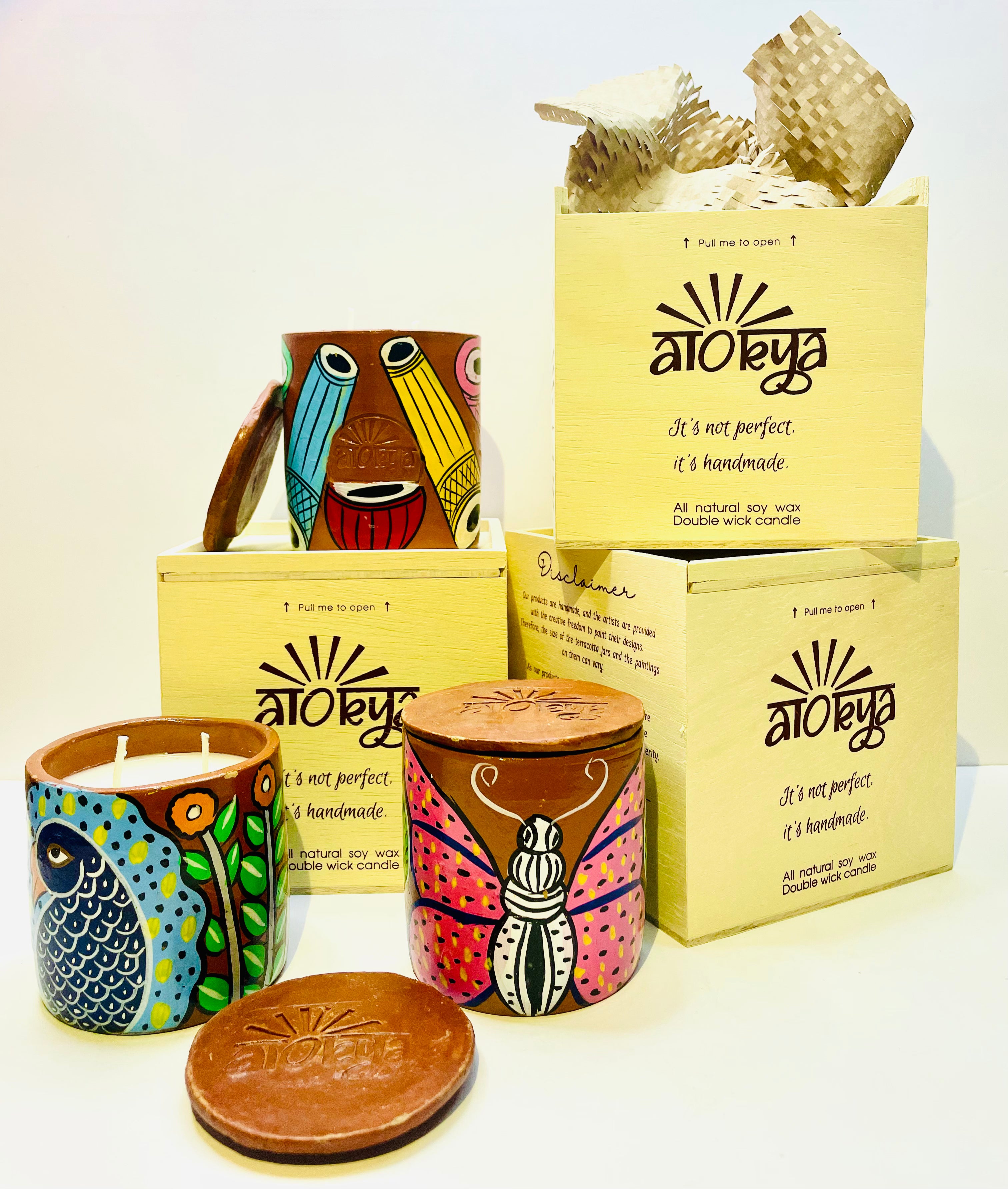 Alokya - 100% natural, soy wax scented candles handpoured in Pattachitra painted terracotta jars.