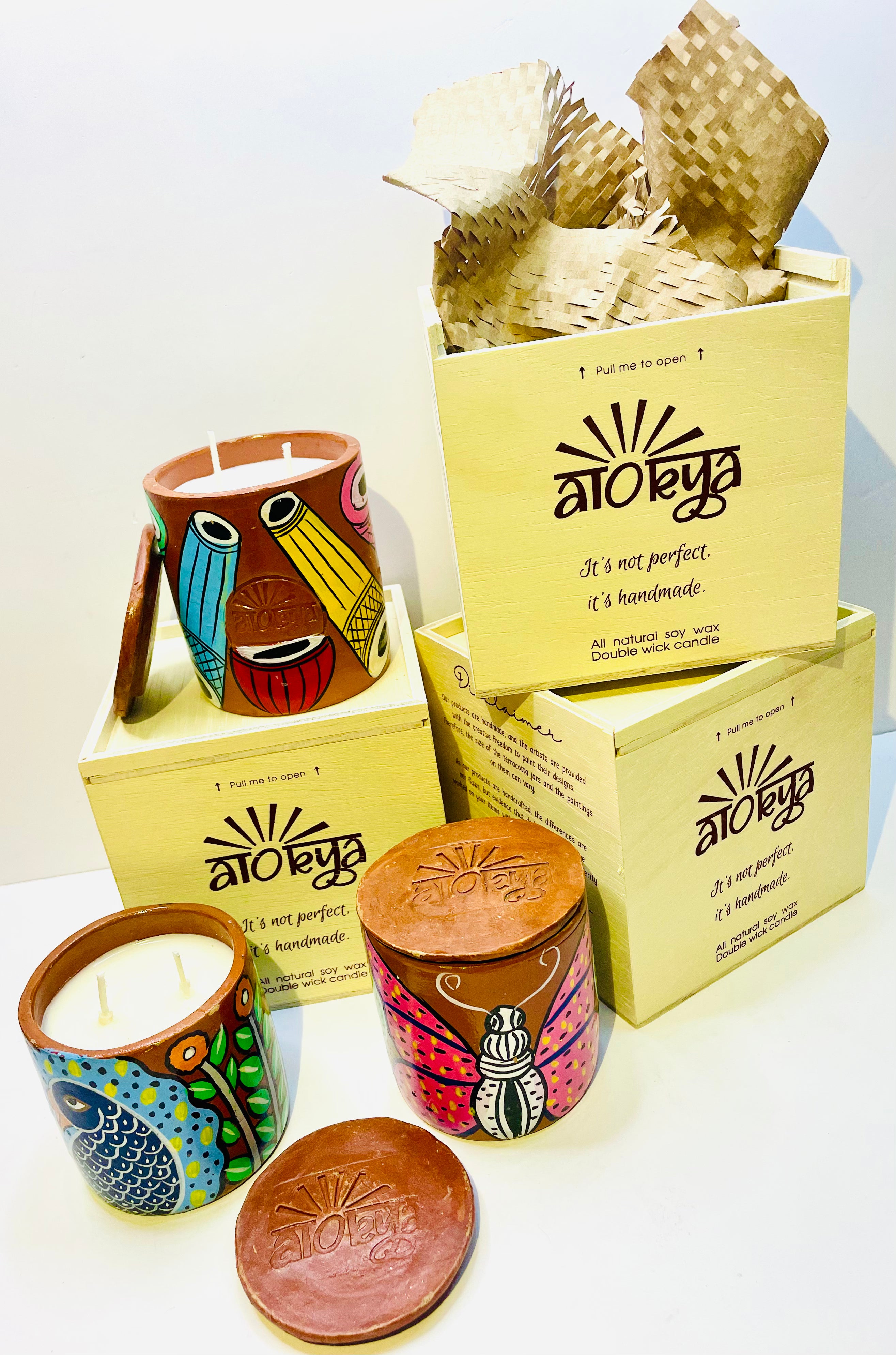 Alokya - 100% natural, soy wax scented candles handpoured in Pattachitra painted terracotta jars.