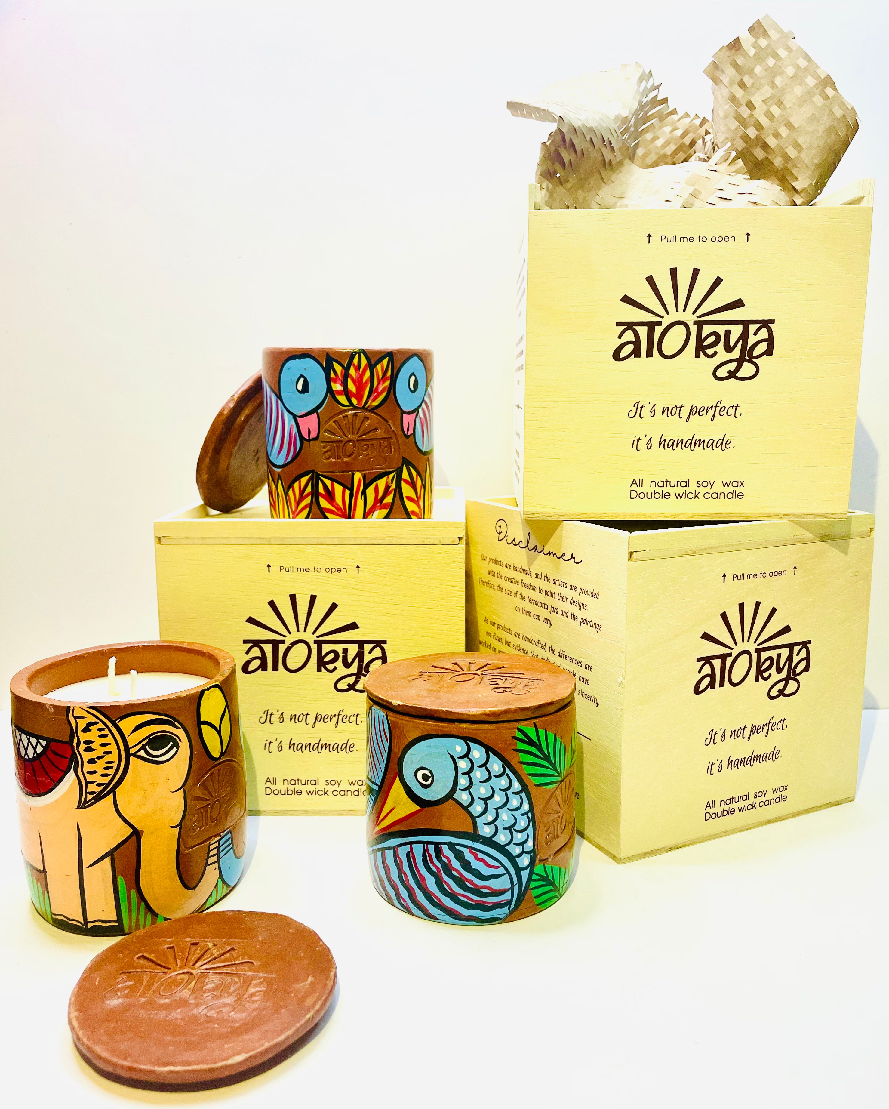 Alokya - 100% natural, soy wax scented candles handpoured in Pattachitra painted terracotta jars.