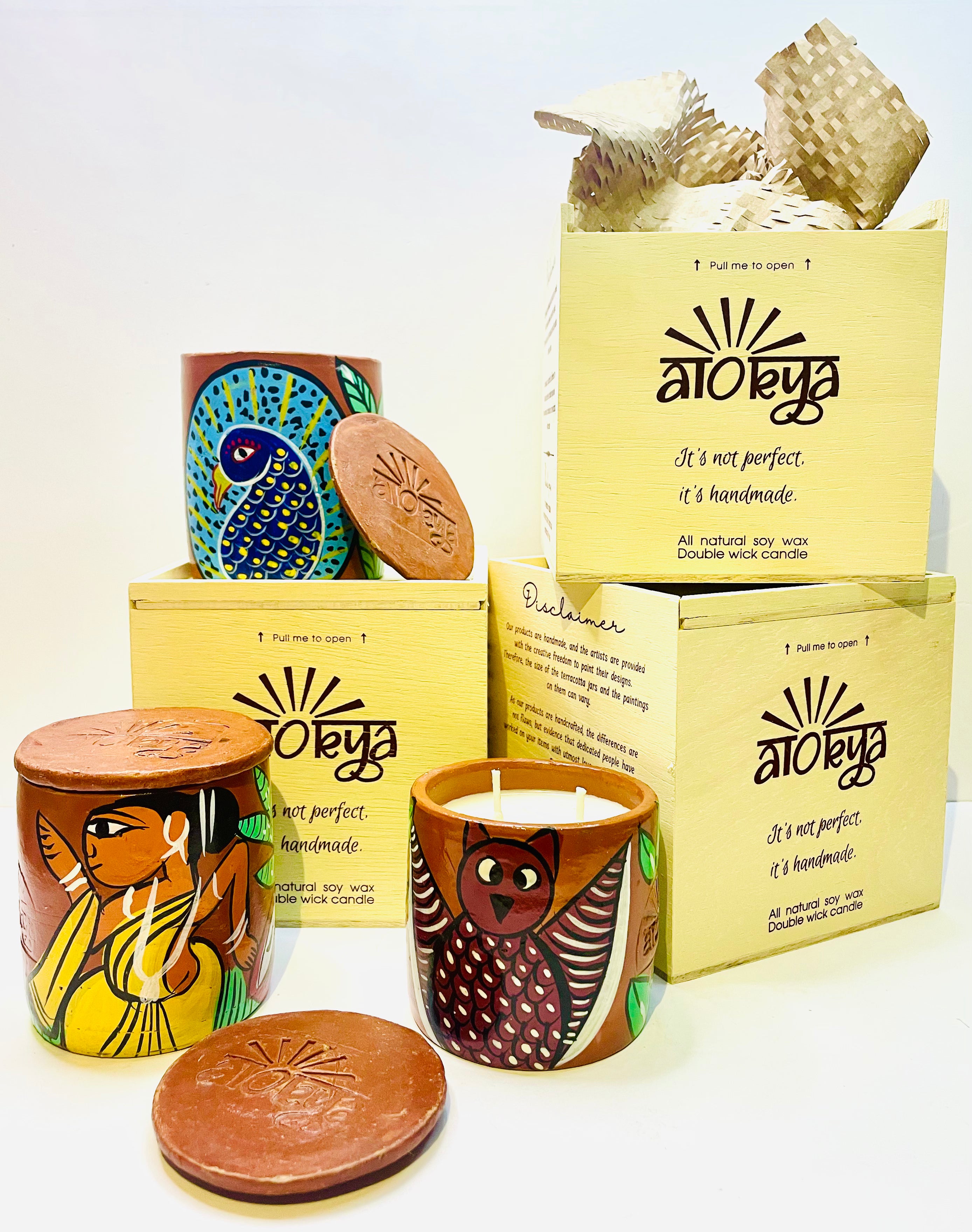 Alokya - 100% natural, soy wax scented candles handpoured in Pattachitra painted terracotta jars.