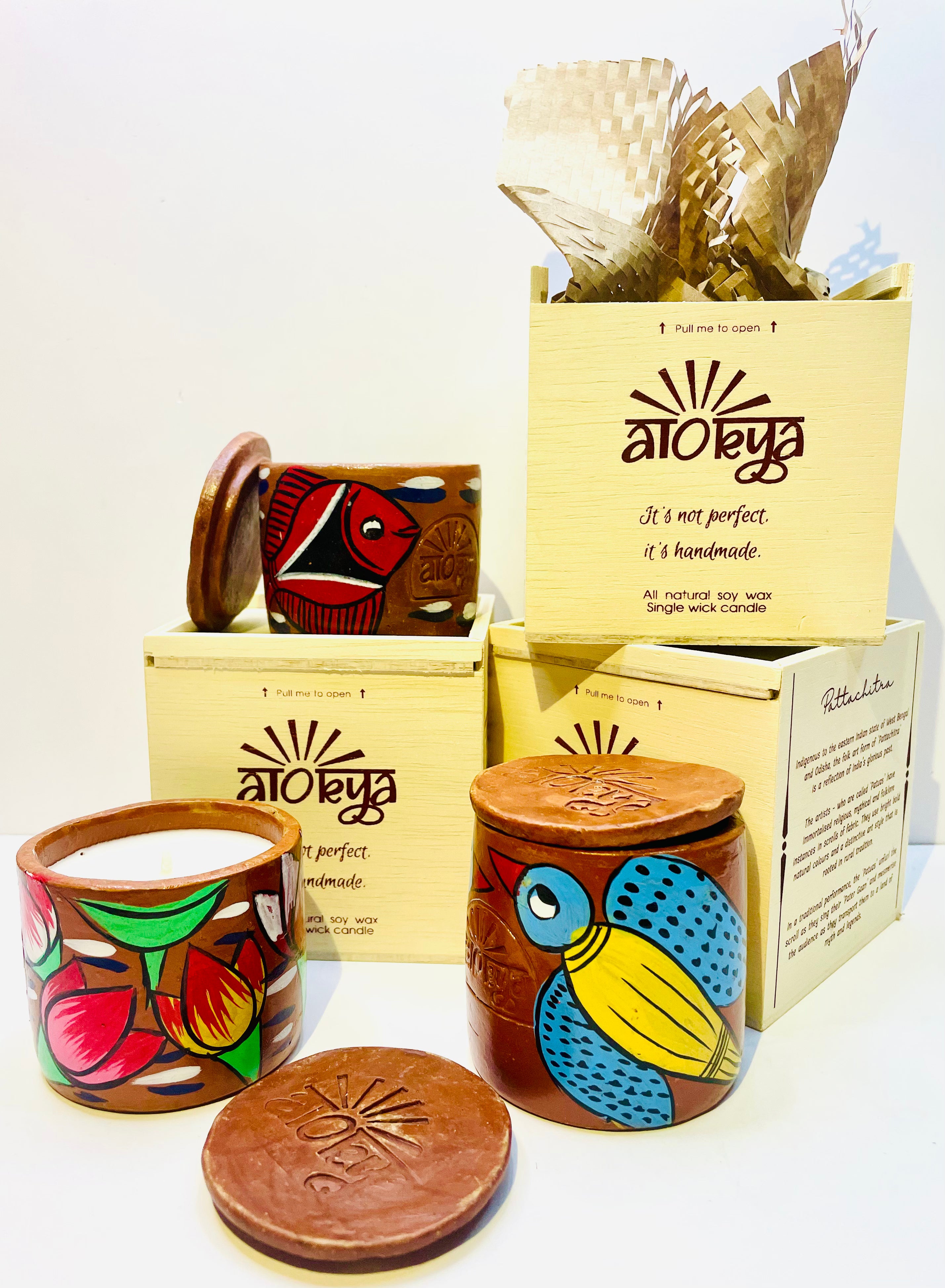 Alokya - 100% natural, soy wax scented candles handpoured in Pattachitra painted terracotta jars.