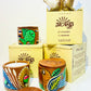 Alokya - 100% natural, soy wax scented candles handpoured in Pattachitra painted terracotta jars.