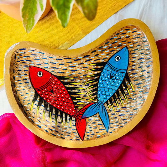 Moon-shaped wooden platter made from locally sourced mango wood and hand-painted with Indian folk art, Pattachitra fish motif by the generational Pattachitra artists of Pingla