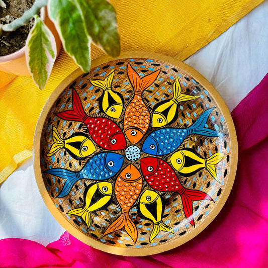 Round wooden tray or trinket tray made from locally sourced mango wood and hand-painted with fish motif by the generational Pattachitra artists of Pingla
